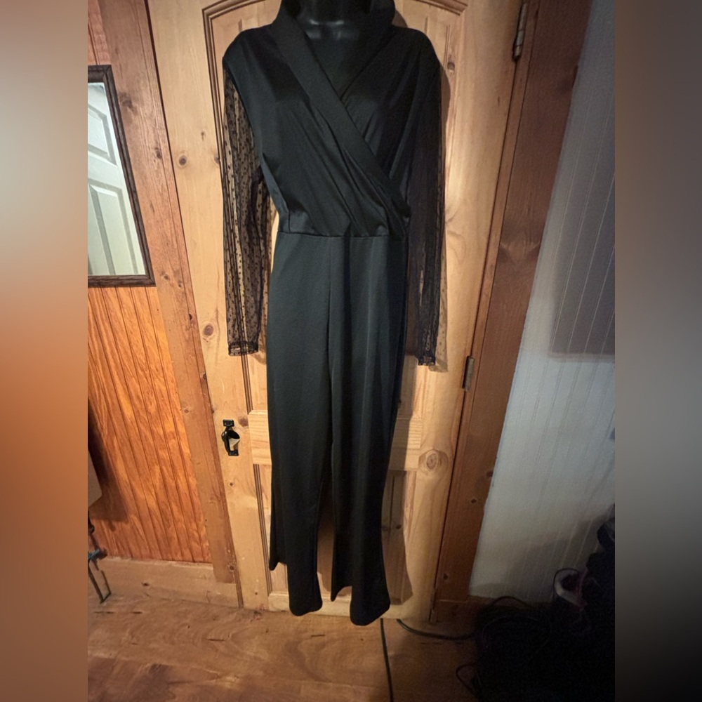 Vutti black jumpsuit with sheer long sleeves